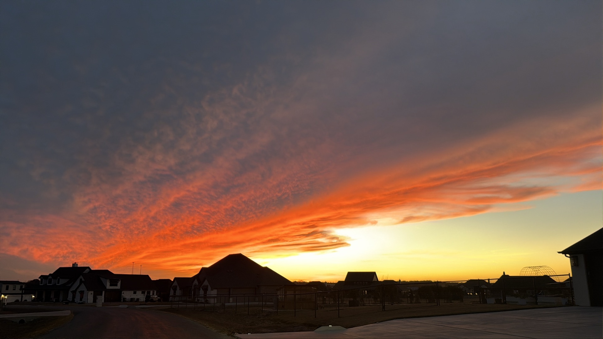 The burning of the summer sun in a field of fire 